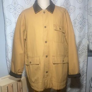 Vintage Timberland insulated Coat With Genuine Leather Collar And Cuffs.
